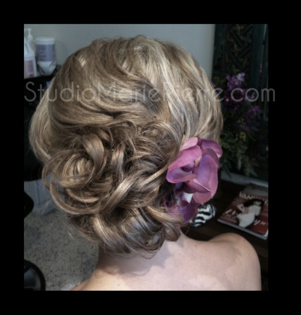 Off to the side loose chignon 